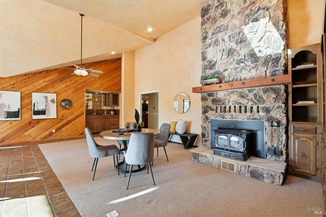 a spacious bathroom with a granite countertop sink a mirror and a