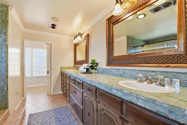 a balcony with wooden floor and outdoor space