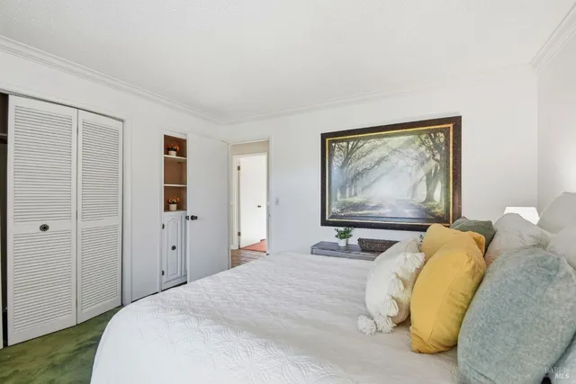 a view of a house with a yard and street view