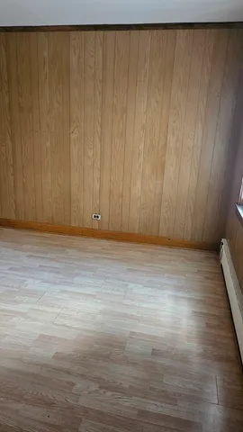 a view of wooden floor and staircase