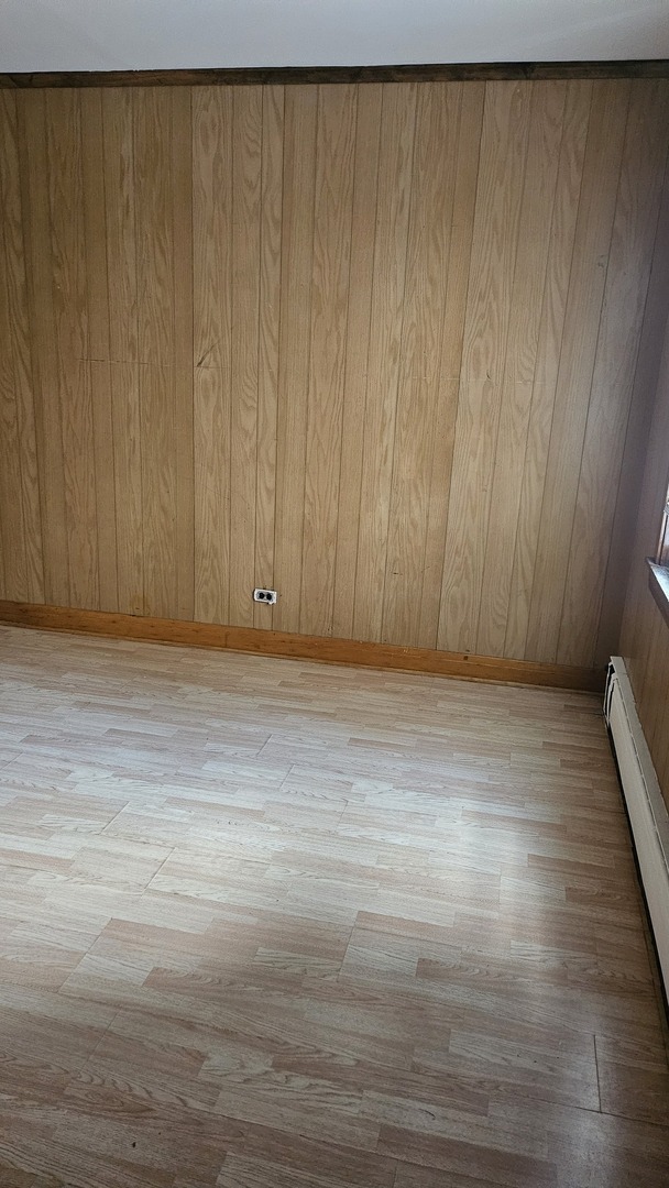 4238 Joliet Avenue, Unit 1R Lyons, IL 60534 - Photo 6 of 9 a view of wooden floor and staircase