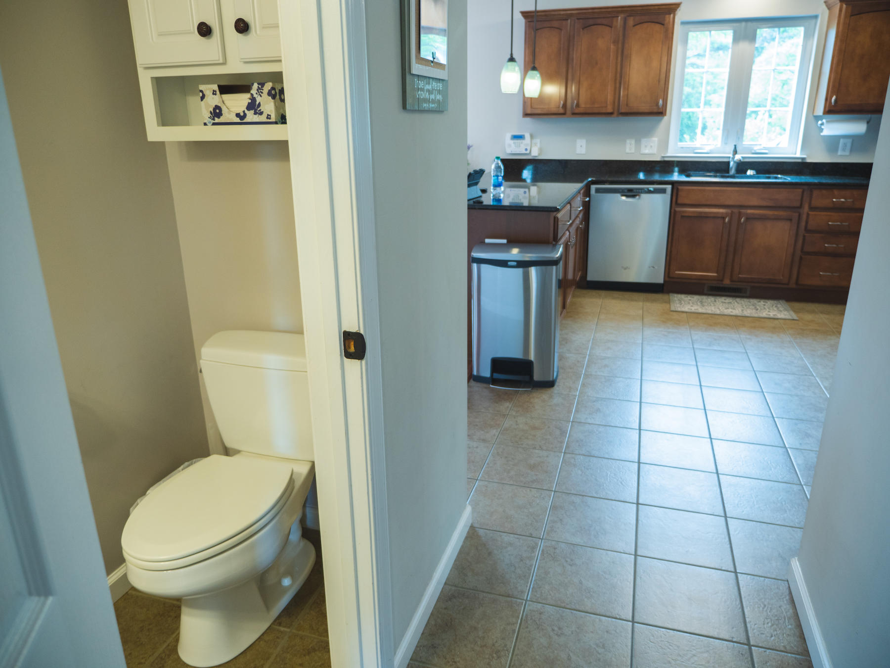 1124 Union Valley Road Riner, VA 24149 - Photo 19 of 67 a kitchen with a sink a toilet and cabinets