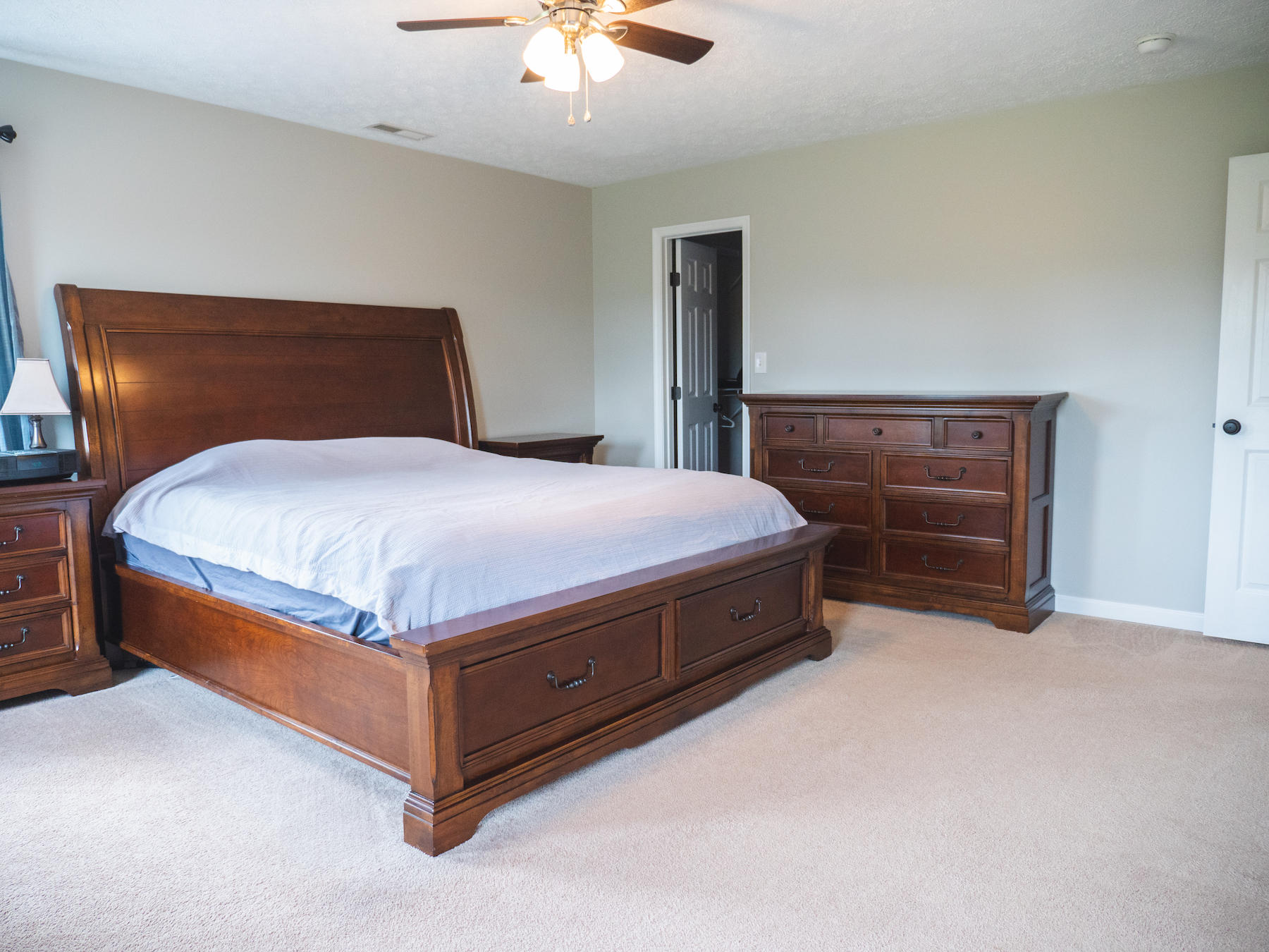 1124 Union Valley Road Riner, VA 24149 - Photo 26 of 67 a bedroom with a bed and a ceiling fan