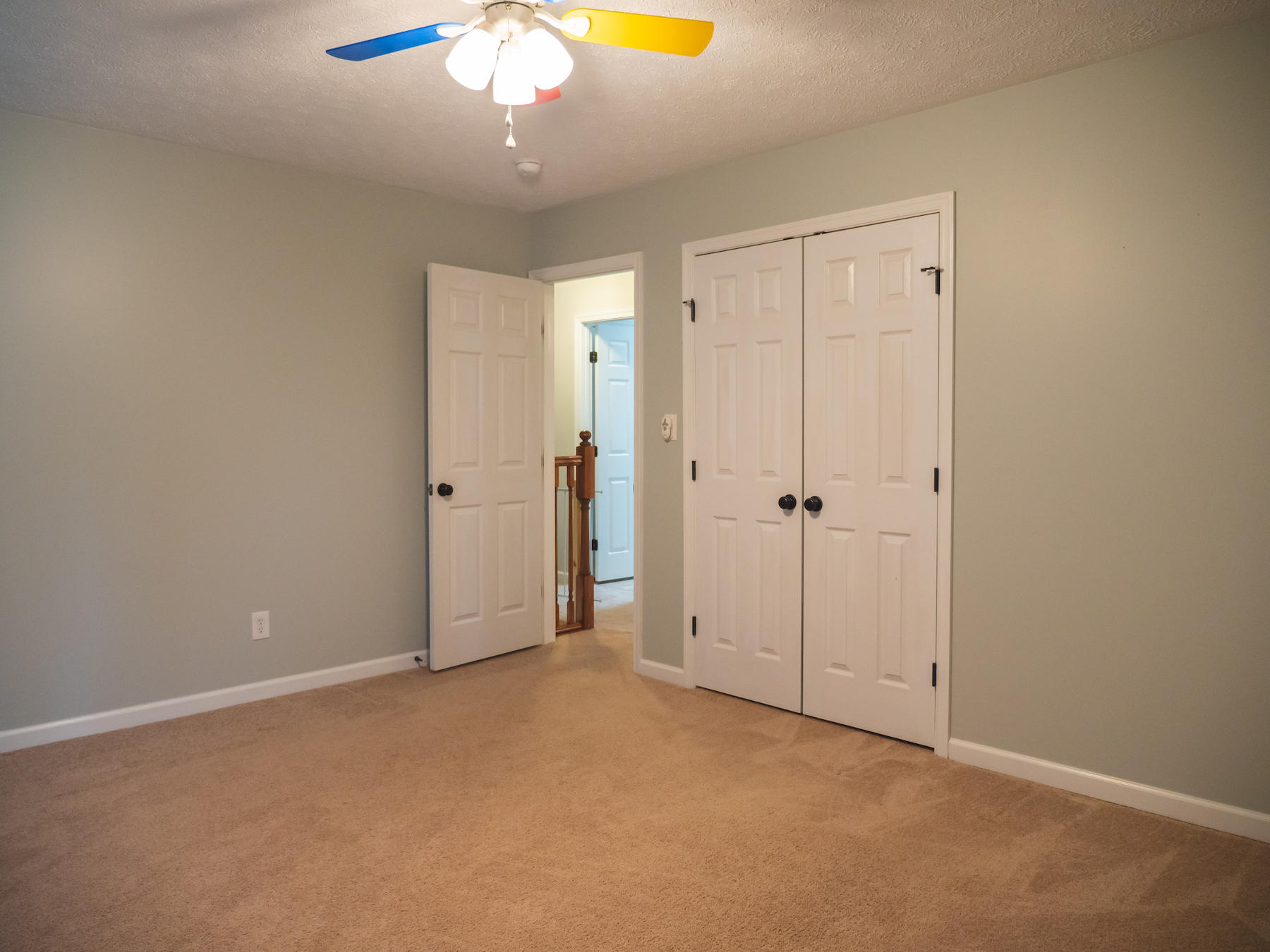 1124 Union Valley Road Riner, VA 24149 - Photo 34 of 67 an empty room with a chandelier fan