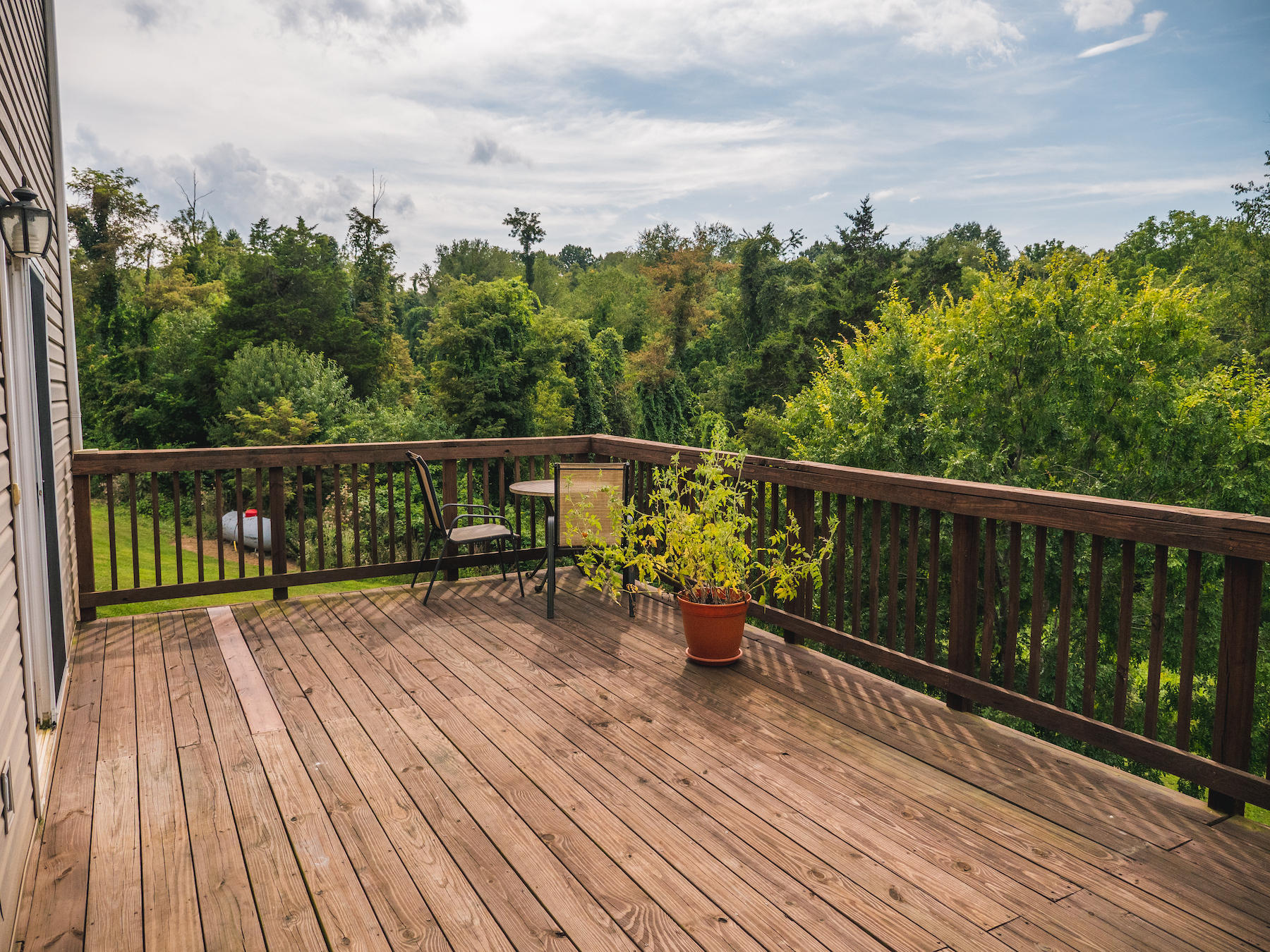 1124 Union Valley Road Riner, VA 24149 - Photo 40 of 67 a view of roof deck with wooden floor and seating