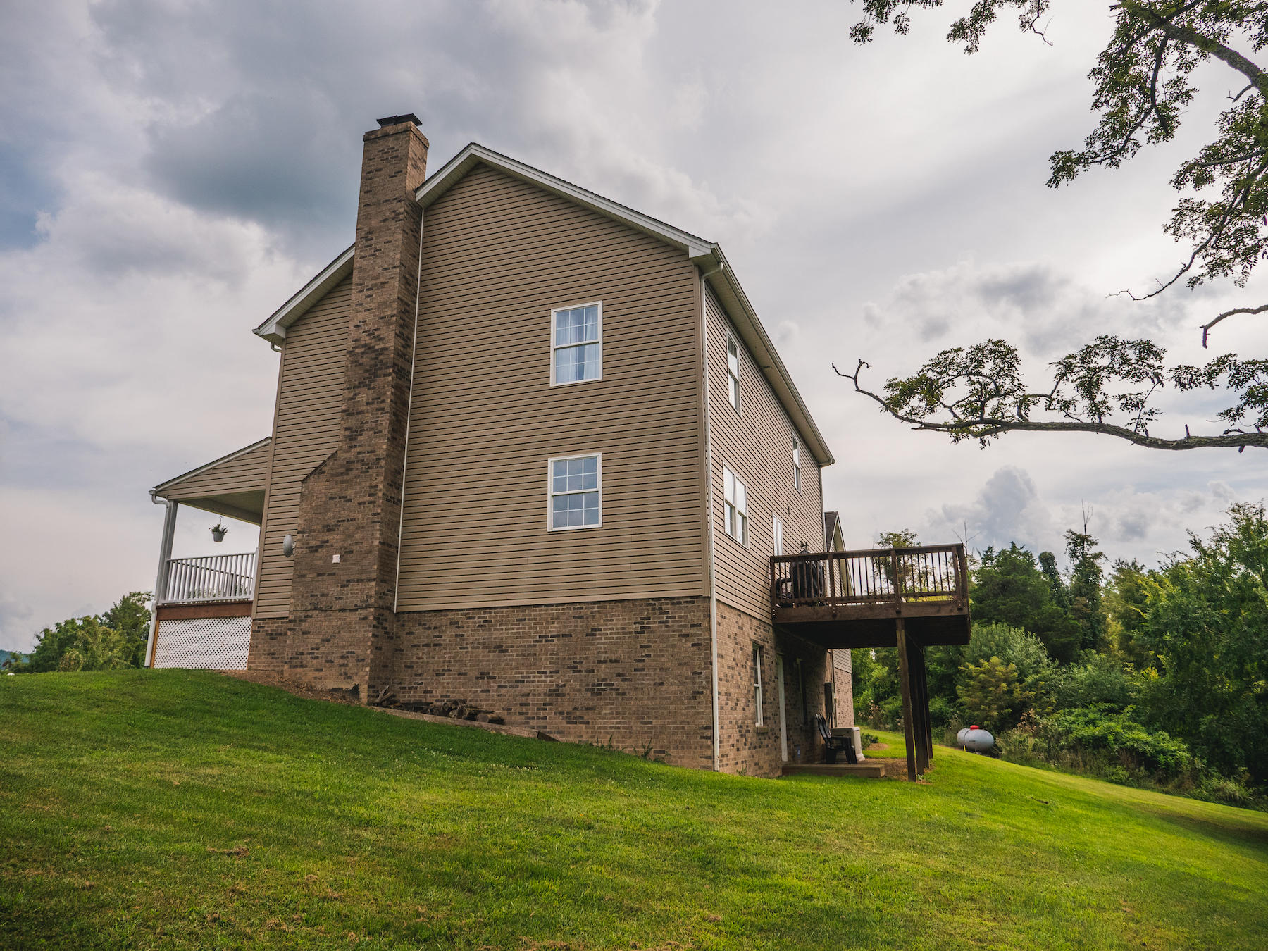 1124 Union Valley Road Riner, VA 24149 - Photo 44 of 67 a front view of a house with garden