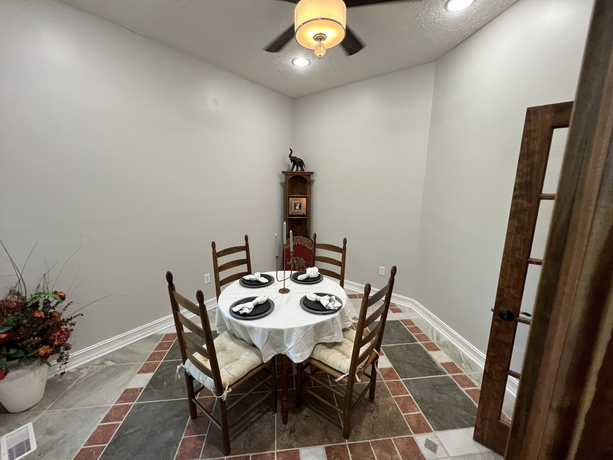 550 Laurel Crown Road Manchester, TN 37355 - Photo 22 of 87 a view of a dining room with furniture and wooden floor