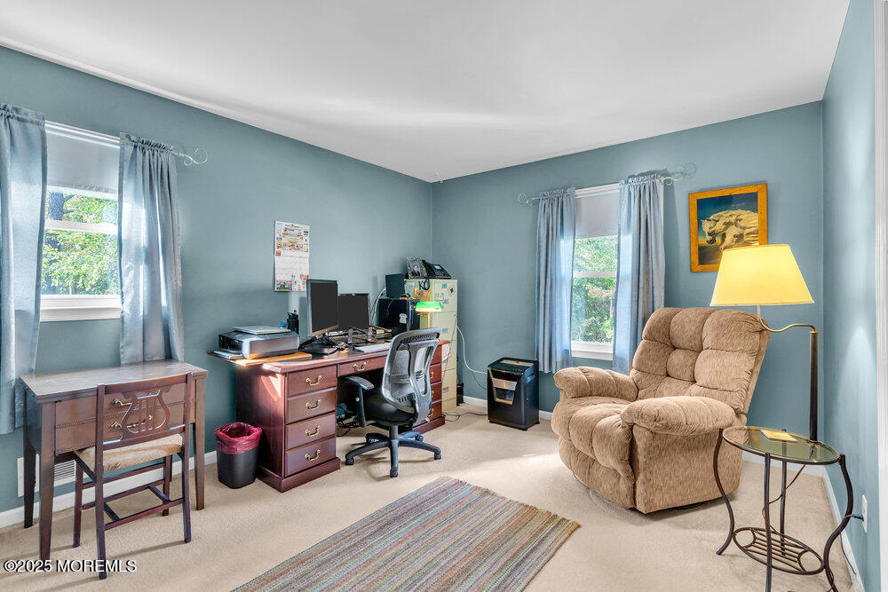 460 Alexander Avenue Howell, NJ 07731 - Photo 8 of 14 a living room with furniture and a window