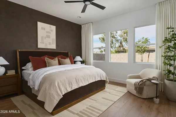a kitchen with sink refrigerator and couches