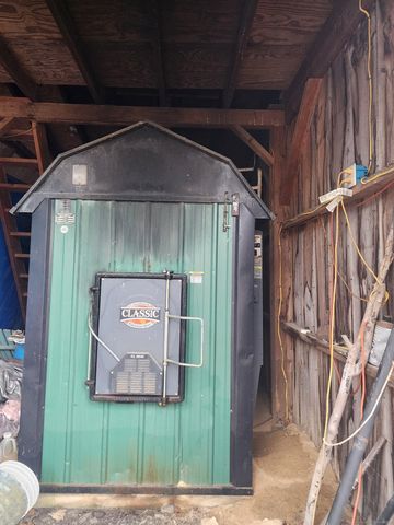 a view of car parked on road with trees