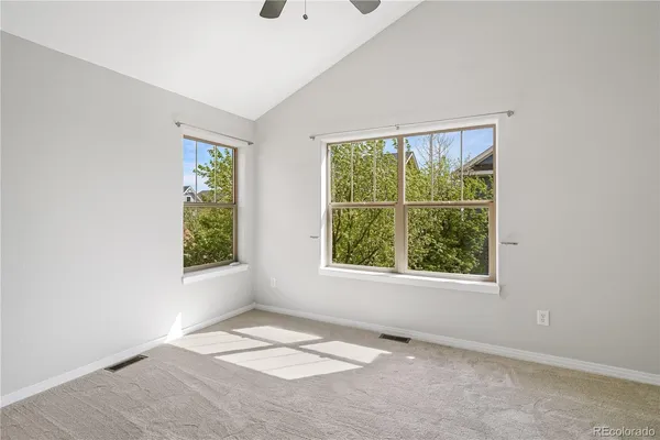 an empty room with windows