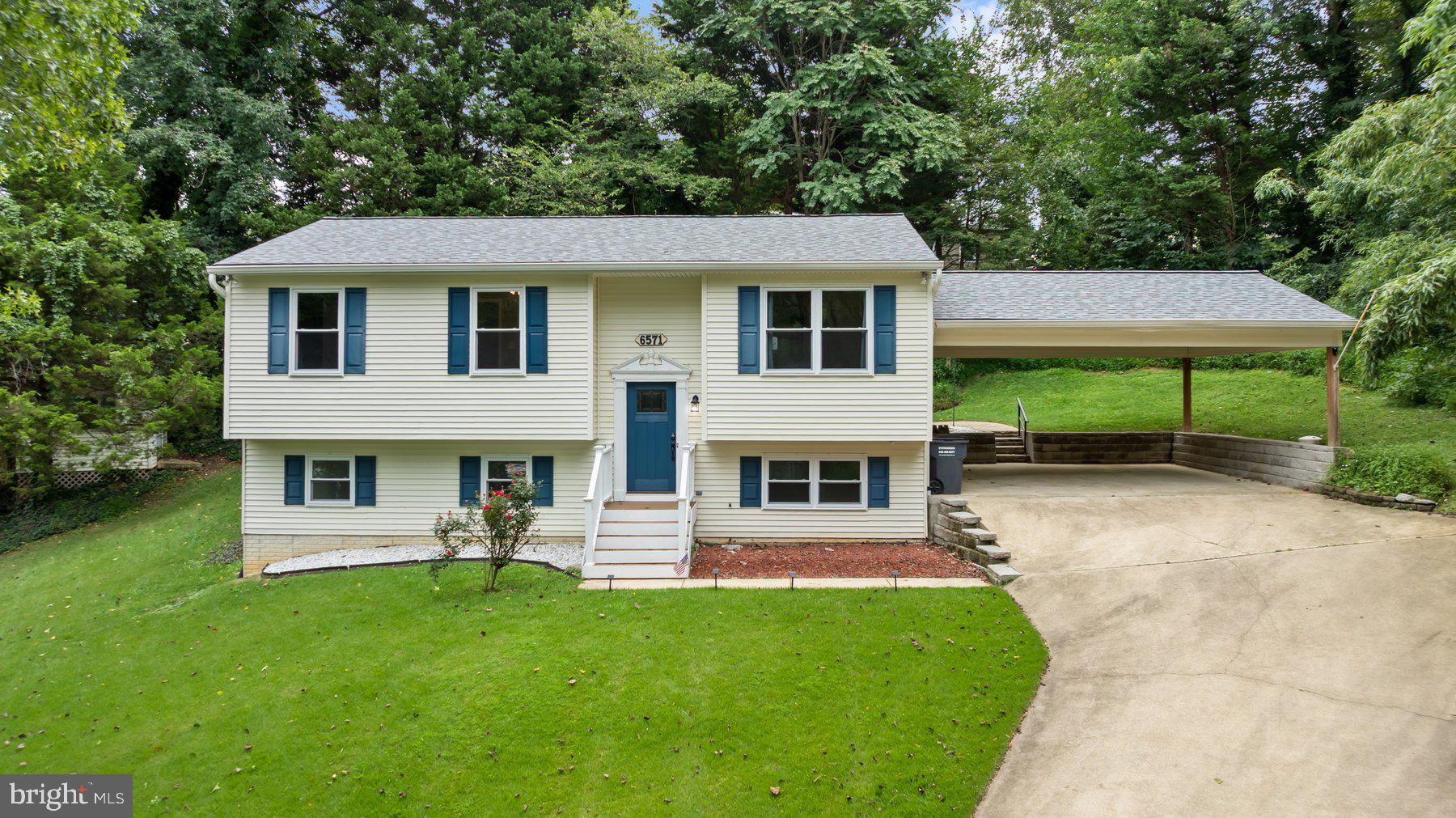 6571 11th Street Chesapeake Beach, MD 20732 - Photo 1 of 36 a view of a house with a yard