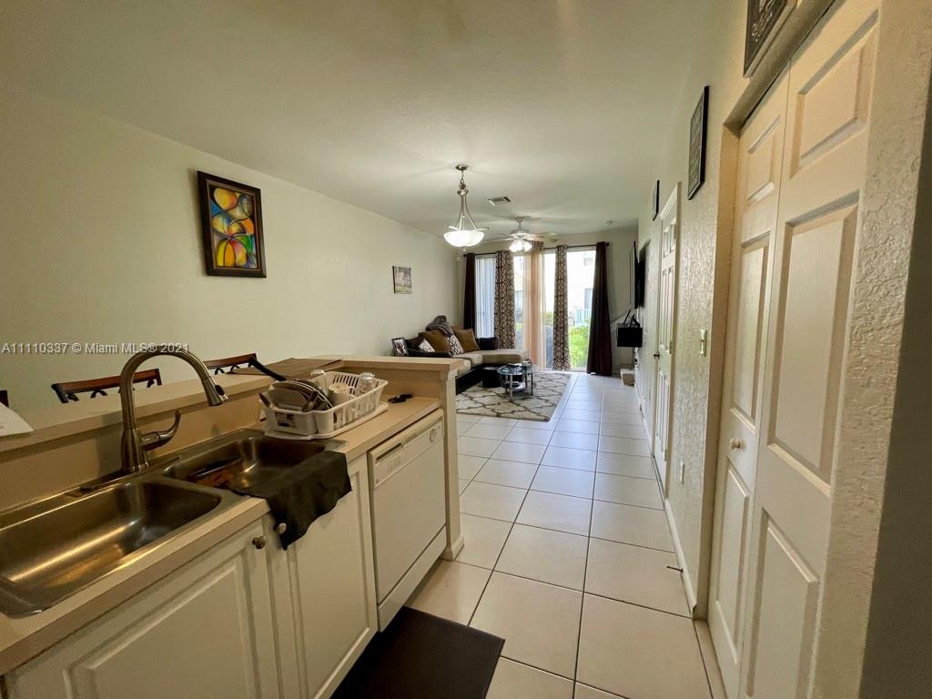 6317 Landings Terrace Tamarac, FL 33321 - Photo 5 of 20 a view of a kitchen with a sink