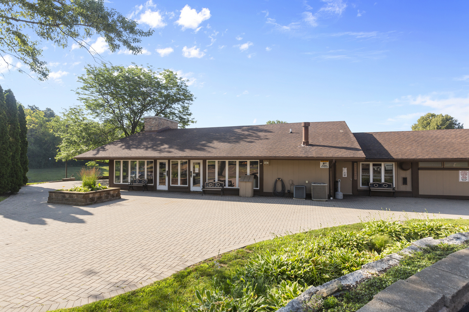 58 Vail Colony, Unit 10 Fox Lake, IL 60020 - Photo 16 of 28 front view of a house with a yard