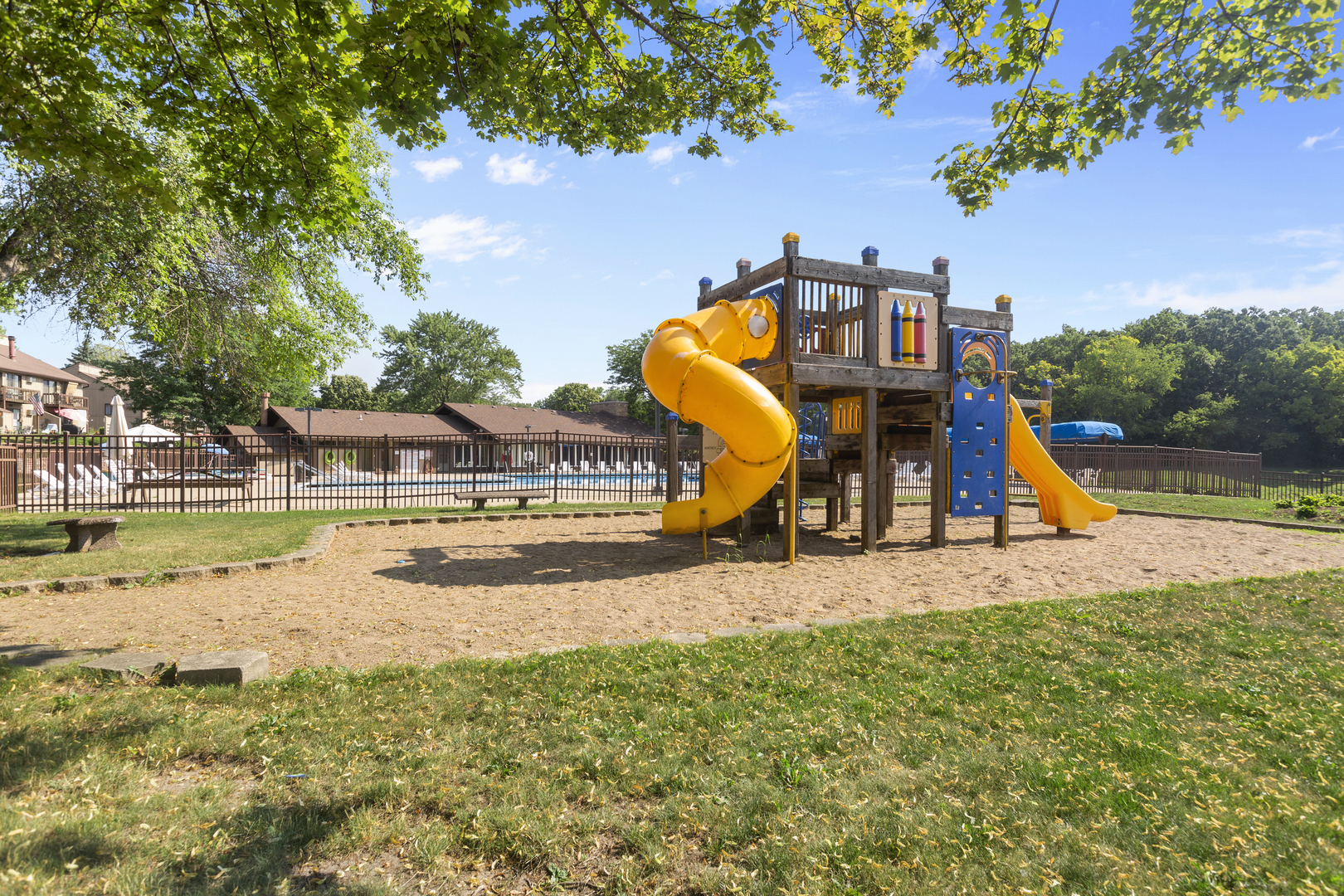 58 Vail Colony, Unit 10 Fox Lake, IL 60020 - Photo 20 of 28 a view of a swimming pool with a yard