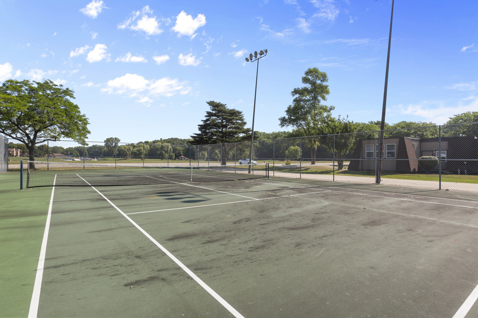 58 Vail Colony, Unit 10 Fox Lake, IL 60020 - Photo 26 of 28 a view of a tennis court