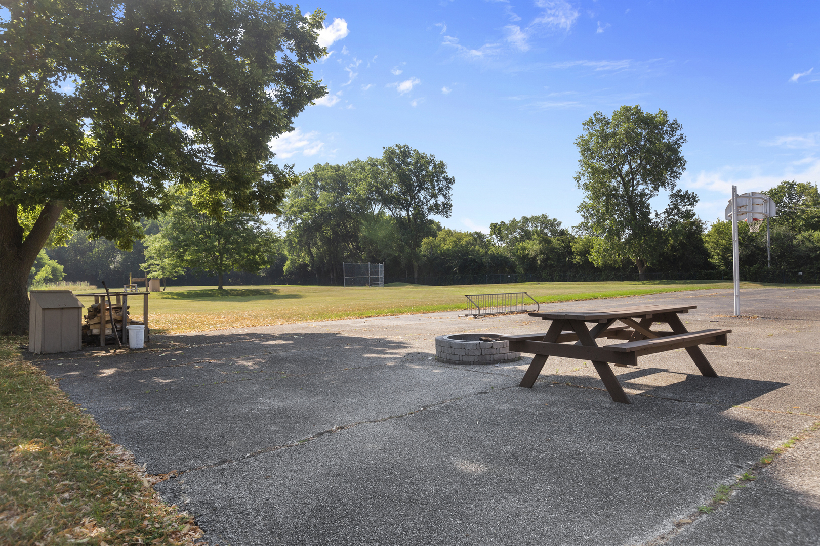 58 Vail Colony, Unit 10 Fox Lake, IL 60020 - Photo 27 of 28 a view of a swimming pool with a lounge chair