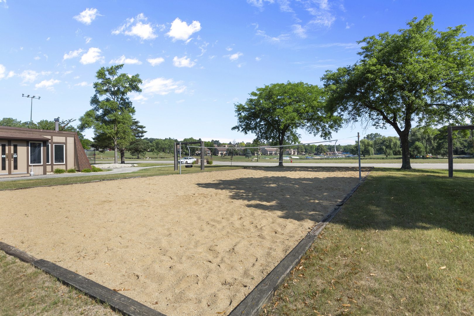 58 Vail Colony, Unit 10 Fox Lake, IL 60020 - Photo 28 of 28 a view of a yard with palm trees
