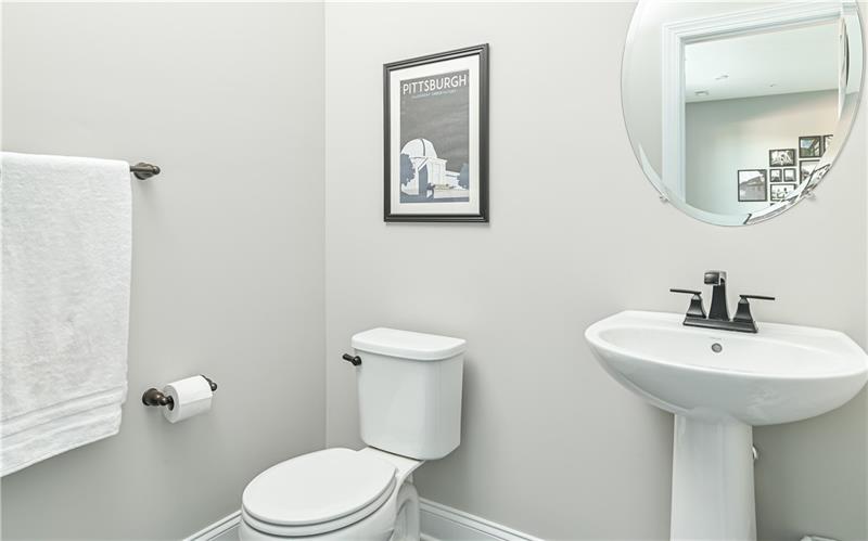 113 Affinity Drive Harmony, PA 16037 - Photo 22 of 40 a bathroom with a toilet sink and mirror