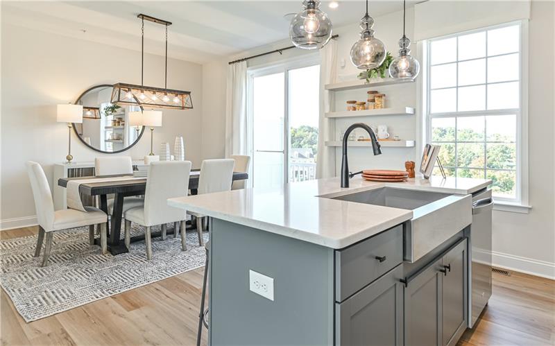 113 Affinity Drive Harmony, PA 16037 - Photo 6 of 40 a kitchen with a table chairs and a window