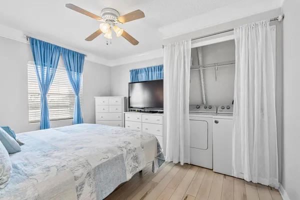 a kitchen with stainless steel appliances a refrigerator and cabinets