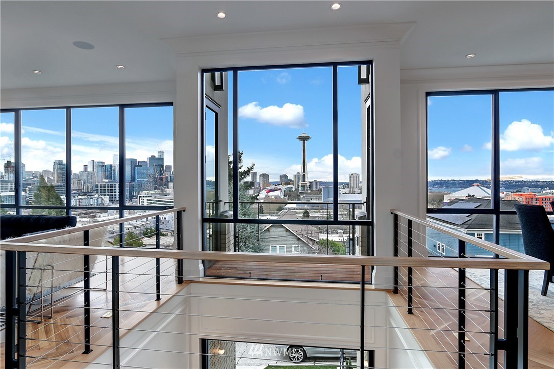 362 Ward Street Seattle, WA 98109 - Photo 11 of 40 a view of a living room with floor to ceiling window and an outdoor kitchen