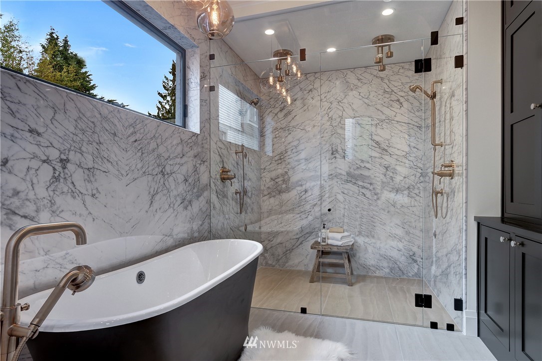 362 Ward Street Seattle, WA 98109 - Photo 17 of 40 a bathroom with a bathtub and shower