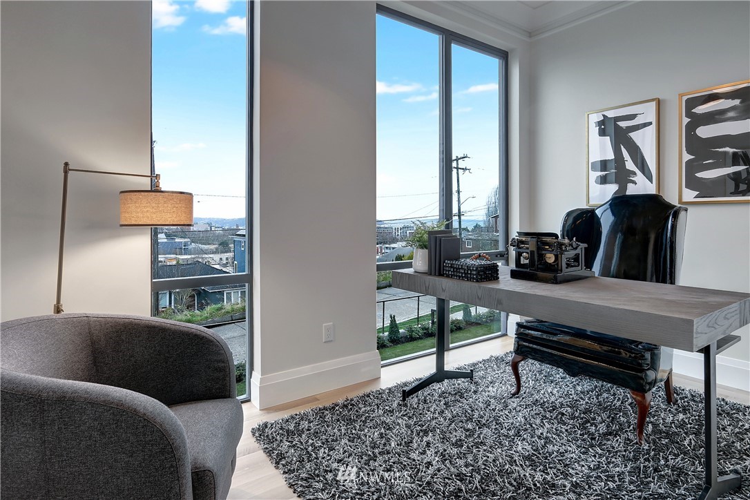 362 Ward Street Seattle, WA 98109 - Photo 23 of 40 a living room with furniture and a window