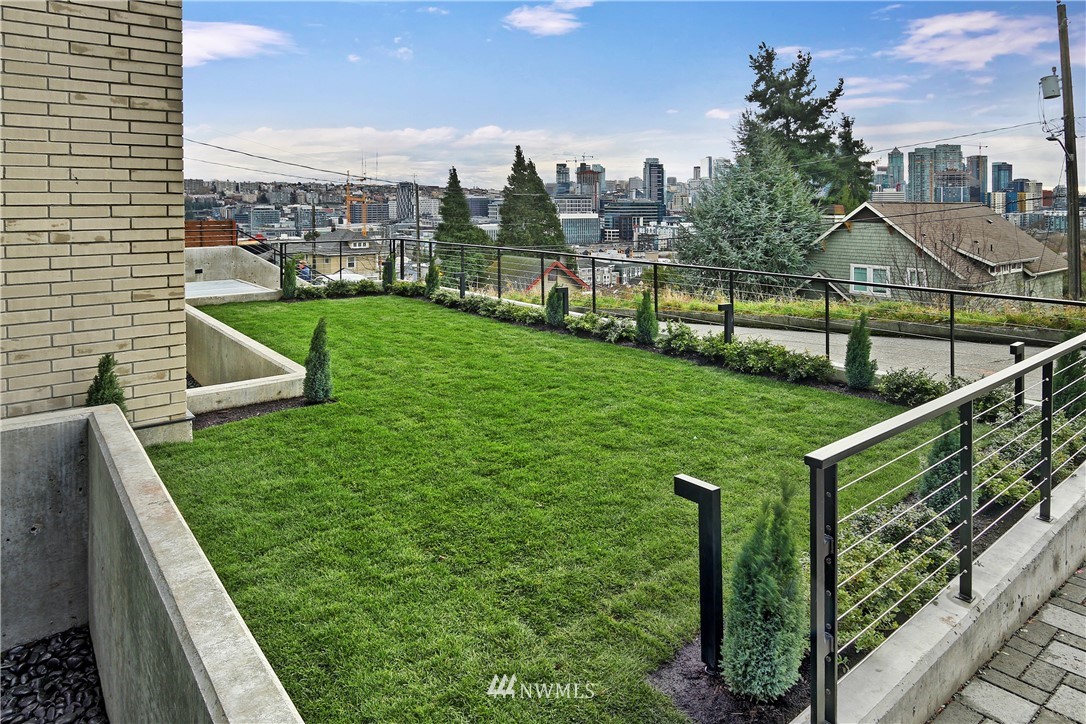362 Ward Street Seattle, WA 98109 - Photo 33 of 40 a view of a garden in front of a house
