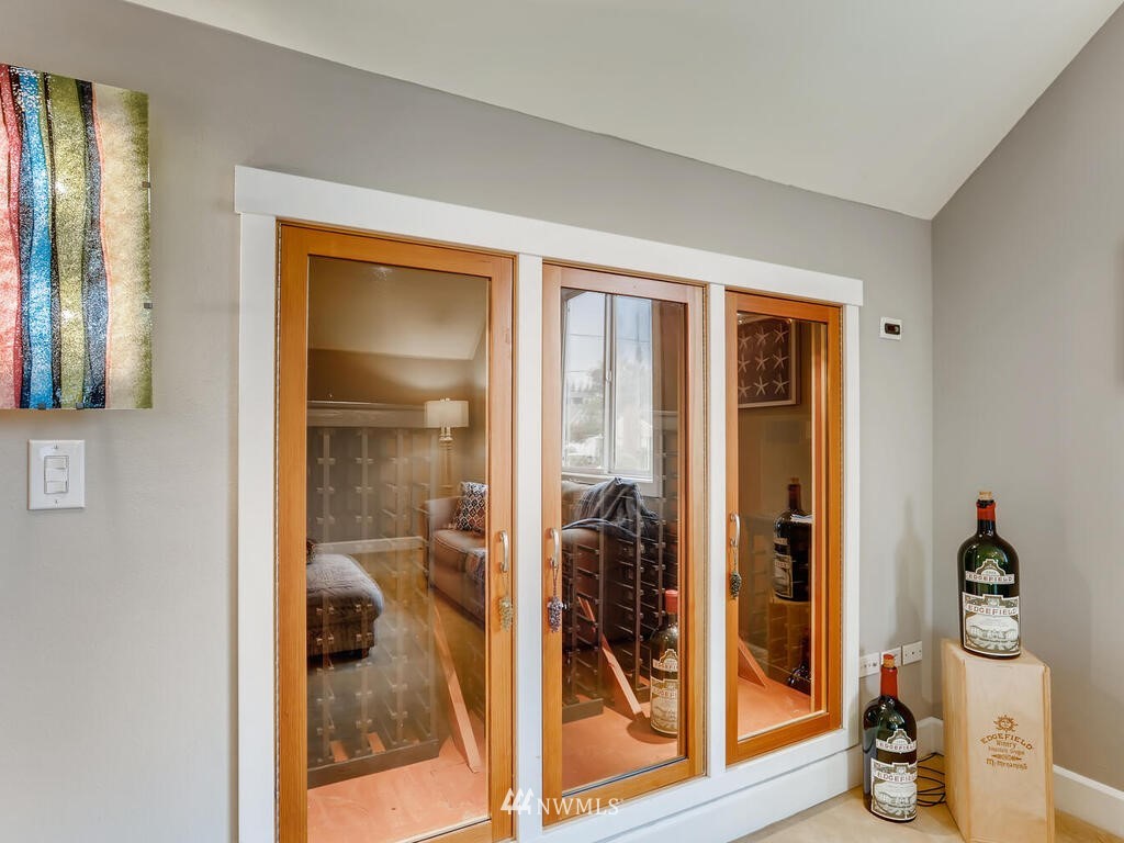 910 North 32nd Street Renton, WA 98056 - Photo 23 of 29 a view of a hallway and a livingroom with furniture