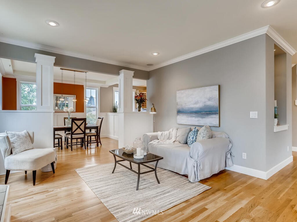 910 North 32nd Street Renton, WA 98056 - Photo 7 of 29 a living room with furniture wooden floor and a table
