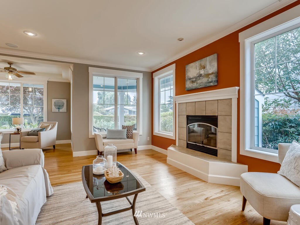 910 North 32nd Street Renton, WA 98056 - Photo 8 of 29 a living room with furniture and a fireplace