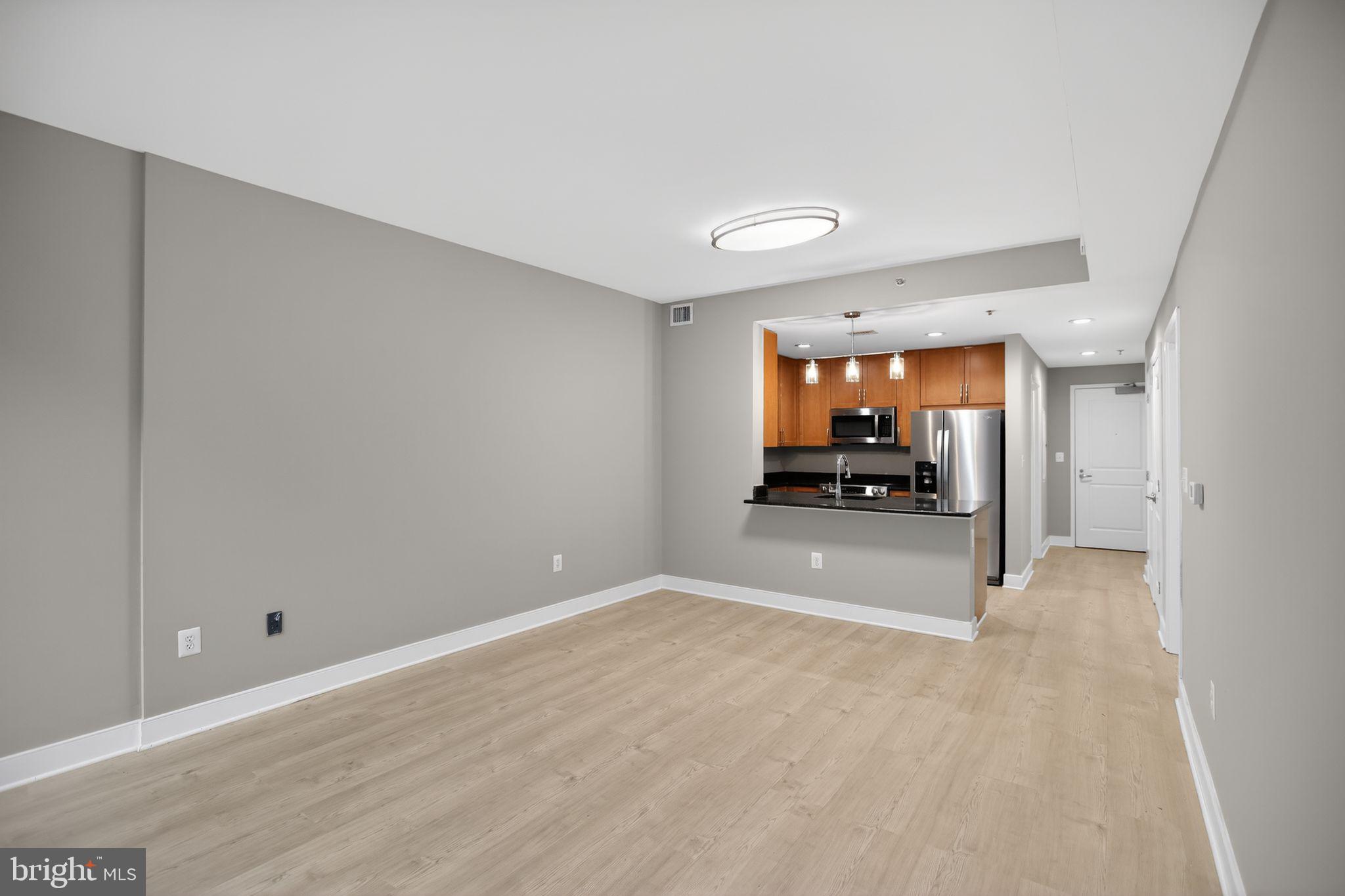 4101 Albemarle Street Northwest, Unit 317 Washington, DC 20016 - Photo 11 of 32 a view of a room with a window