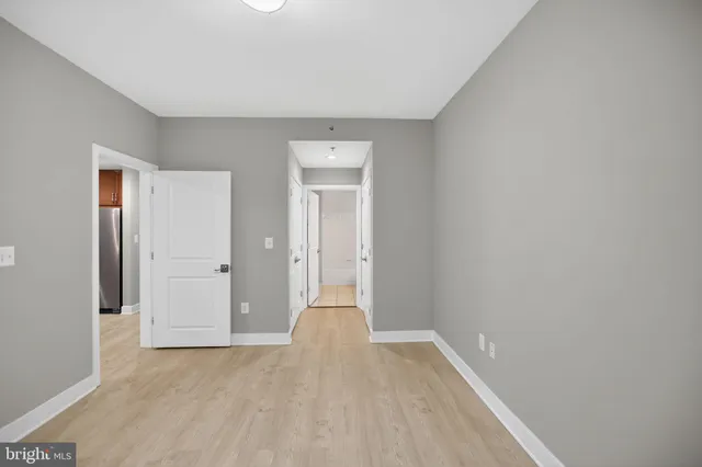 a bathroom with a sink vanity and a mirror