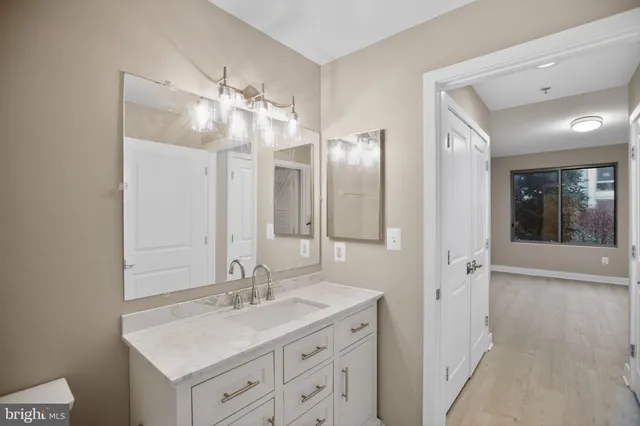 a bathroom with a toilet a sink and a bathtub