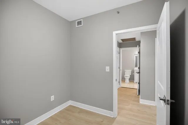 a view of entryway with wooden floor