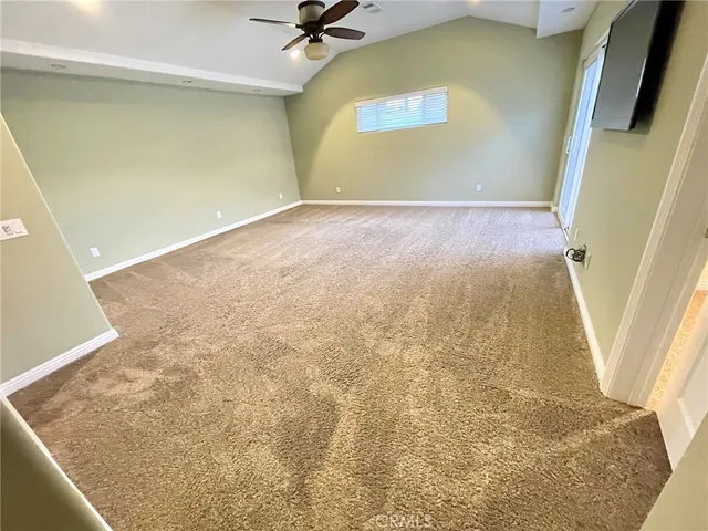 a view of a big room with a door