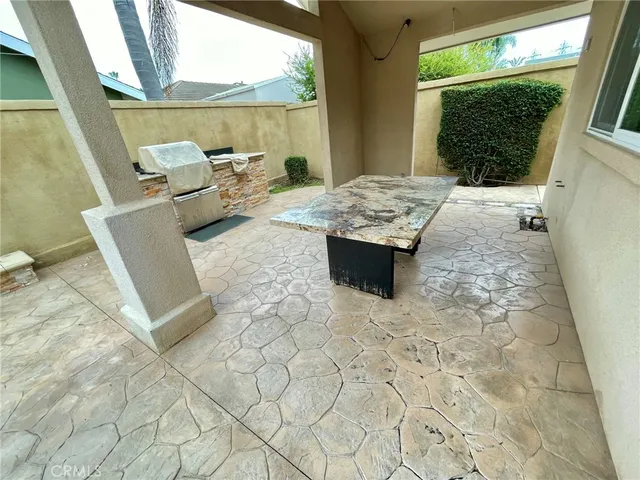 a outdoor space with patio the couch and wooden floor