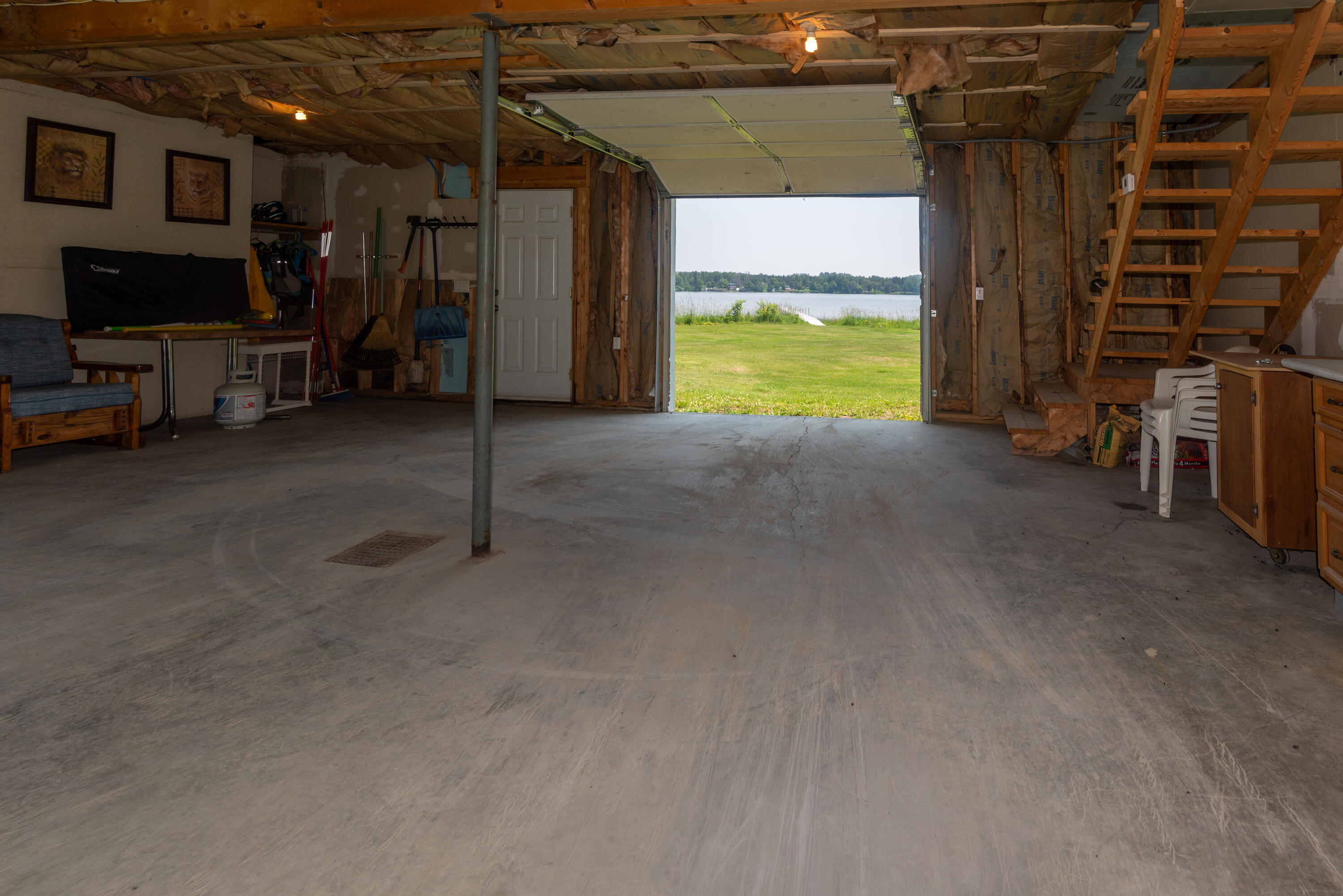 152 Island Road St. Agatha, ME 04772 - Photo 47 of 52 Garage with door to lake