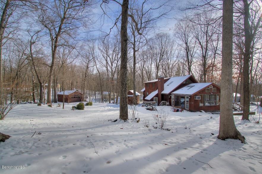 27 A Birch Road Copake, NY 12516 - Photo 2 of 16 a view of a road with a stove