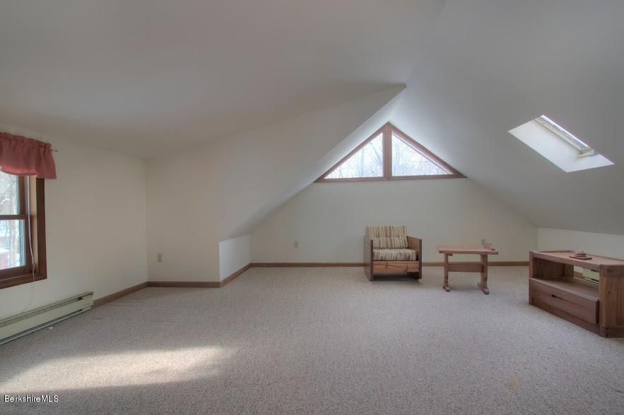 27 A Birch Road Copake, NY 12516 - Photo 11 of 16 an empty room with furniture and windows