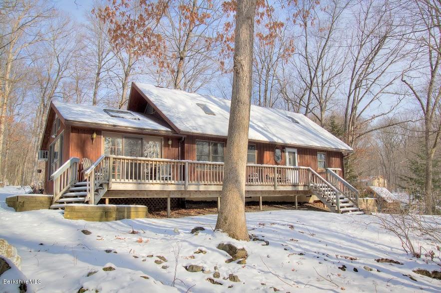 27 A Birch Road Copake, NY 12516 - Photo 13 of 16 a front view of a house with a yard