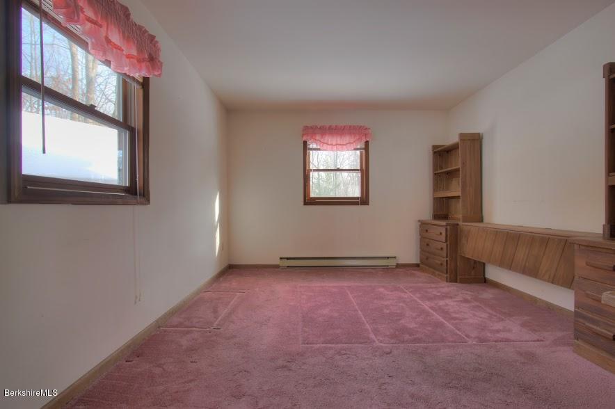 27 A Birch Road Copake, NY 12516 - Photo 9 of 16 a view of an empty room with a window