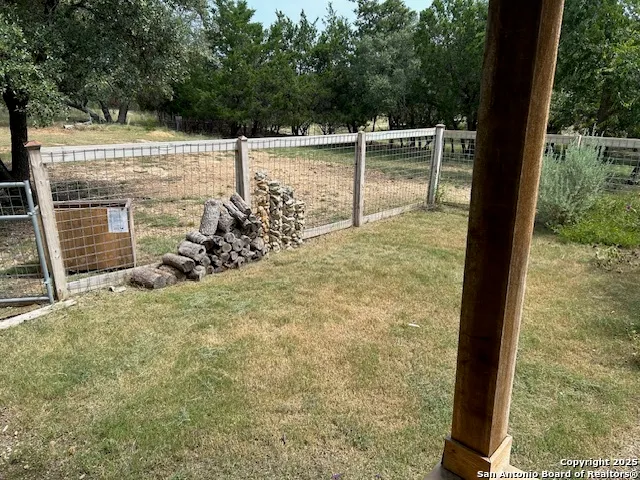 a view of a wooden fence