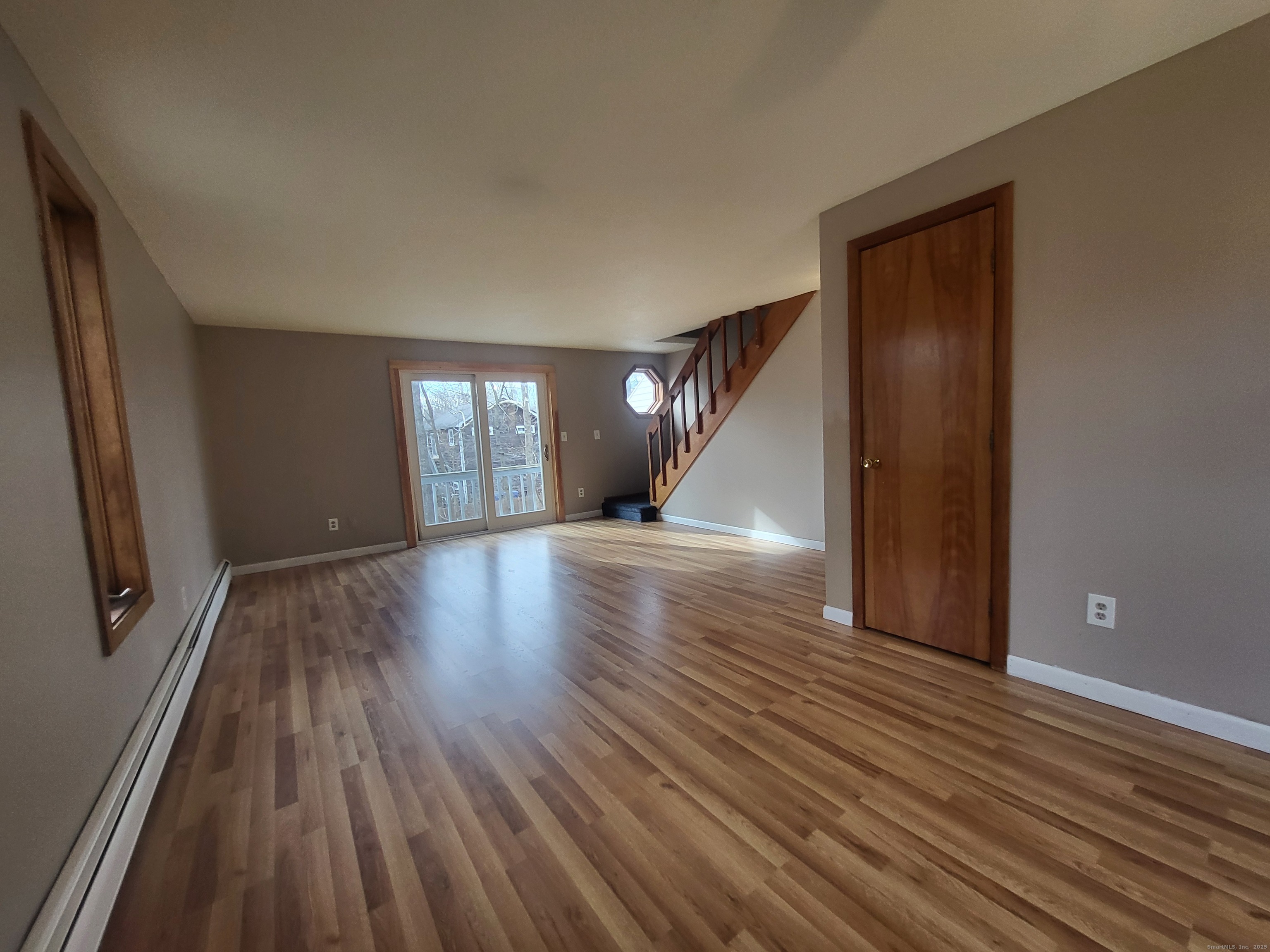 1730 Farmington Avenue, Unit A Farmington, CT 06085 - Photo 4 of 10 wooden floor in an empty room with a window