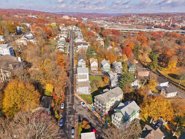 an aerial view of residential building and parking space