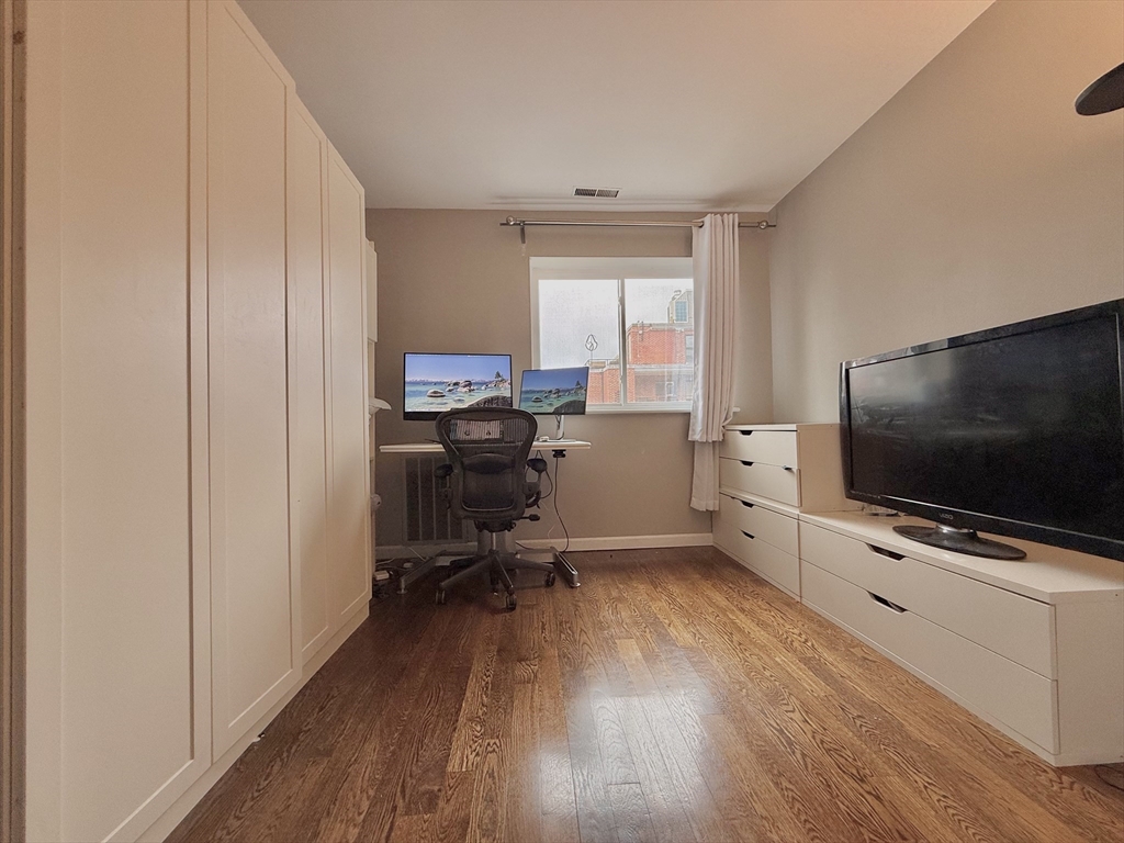 20 Stearns Road, Unit 45 Brookline, MA 02446 - Photo 14 of 22 a view of a livingroom with workspace and a window