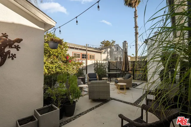 a building outdoor space with patio furniture