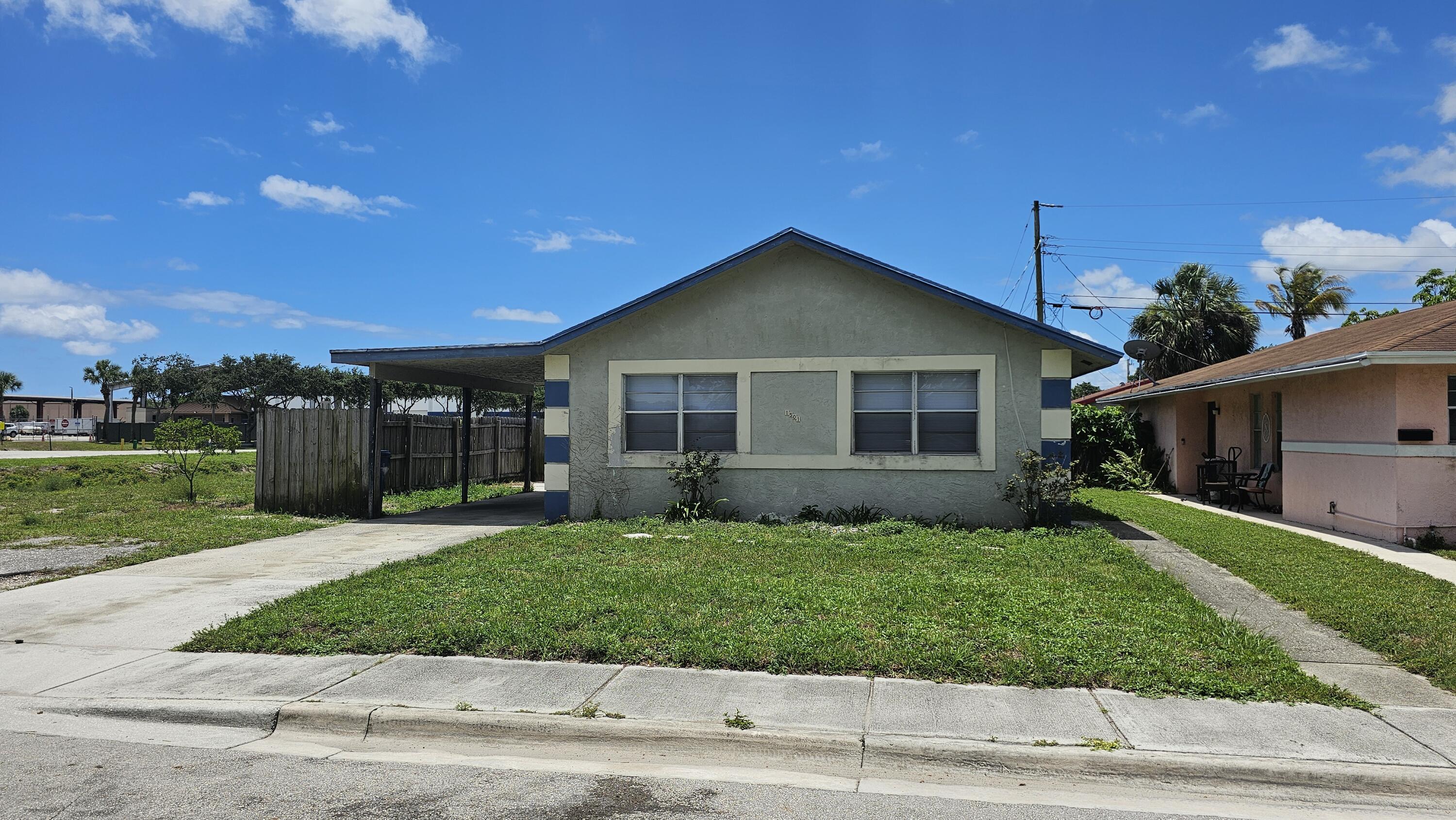 1501 West 17th Street Riviera Beach, FL 33404 - Photo 1 of 17 Front