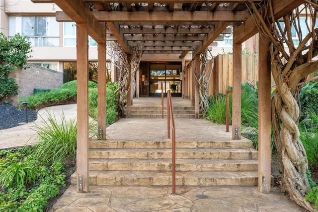 a view of a entrance gate of a house